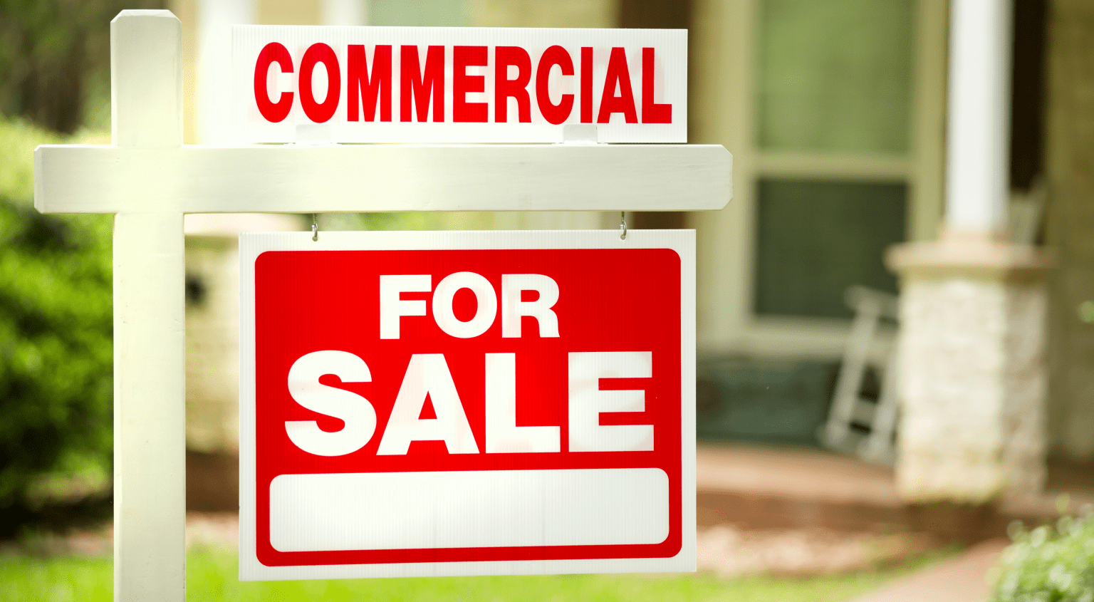 Commercial property real estate for sale sign